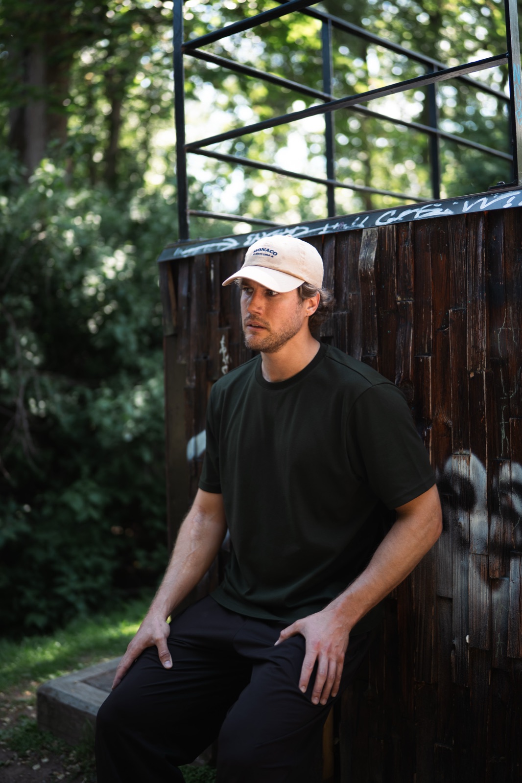 SNT campaign, skater portrait against a wooden wall